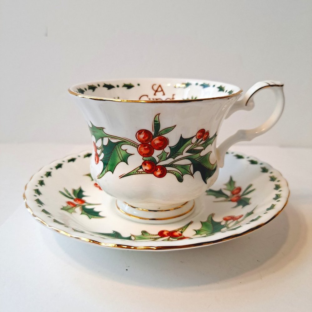 A Cup Of Christmas Tea Cup & Saucer Bone China Gold Trim Waldman House Tom Hegg